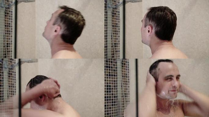 英俊的年轻人在酒店浴室洗澡。身体护理。水流。打开水