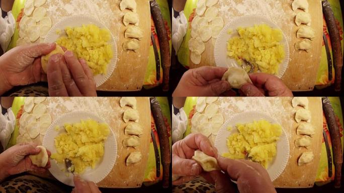 POV手把土豆和勺子从盘子里放进去糊状，然后把瓦里尼克模