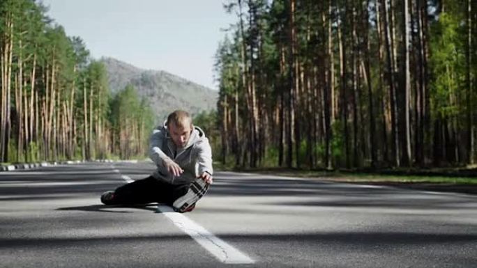 男子跑步前热身