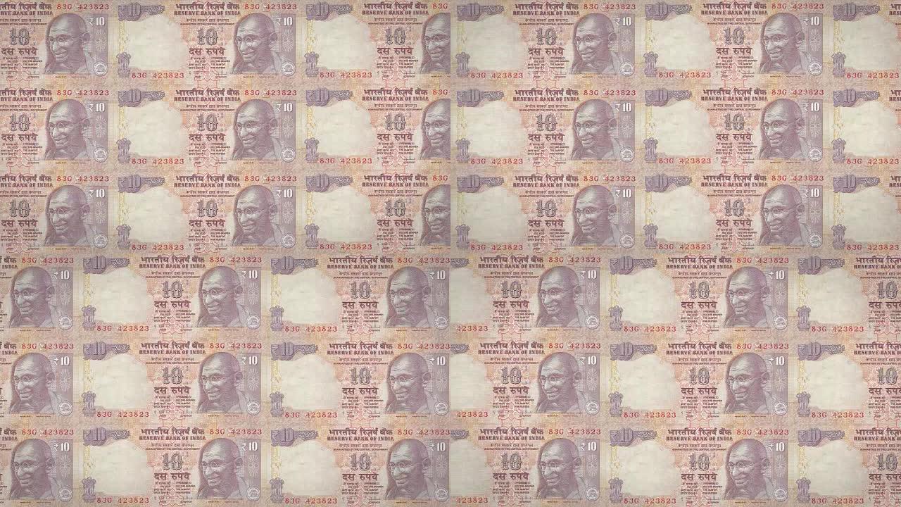 印度滚动的十印度卢比纸币，现金，循环