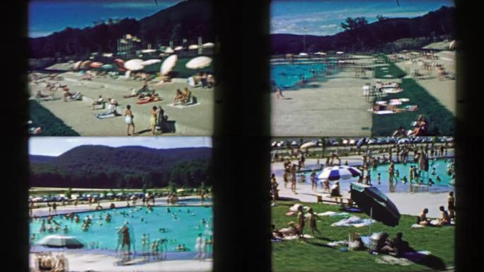 1957: 经典的公共泳池区的人们在一个慵懒的夏日晒太阳。