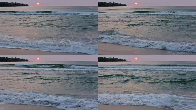 升起的太阳在海面上。