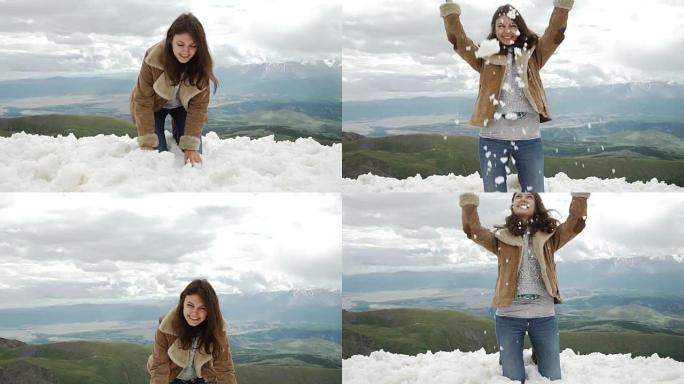快乐的女人在冬季山区跳跃，活跃的女性享受自然，女孩在雪地里玩耍，青少年在户外玩得开心，健康的生活方式