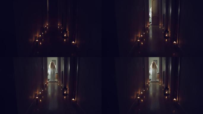 4k惊悚片在长长的大厅里用蜡烛拍摄，一个白色的幽灵打开了门