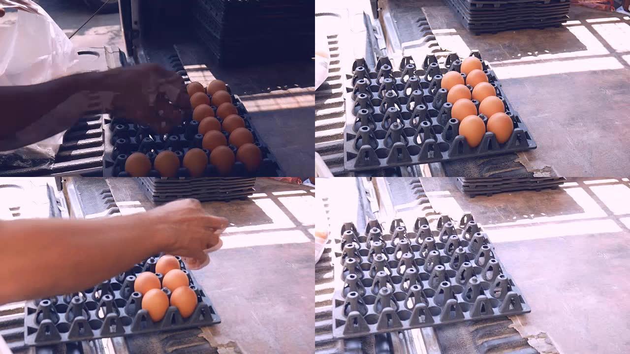 商人将鸡蛋放入塑料袋中零售给客户