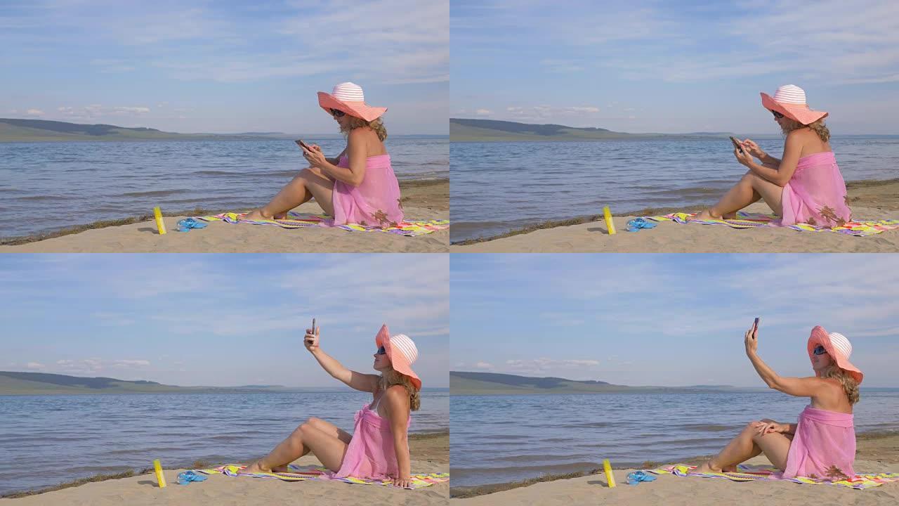 海滩上有手机的女人。