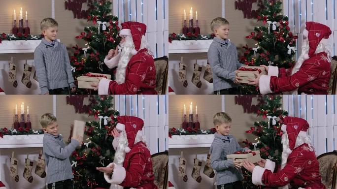 圣诞老人竖起大拇指给小男孩送礼物，男孩摇了摇盒子