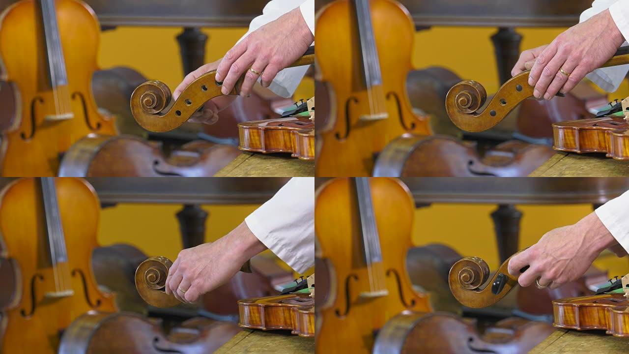 琴师调大提琴的四弦