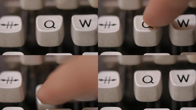 老式复古打字机上的手指打字字母Q。