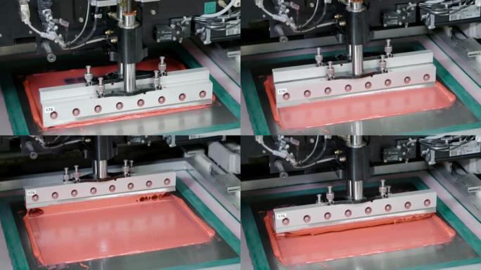 机器导致印刷电路板上的粉红色密封剂。特写