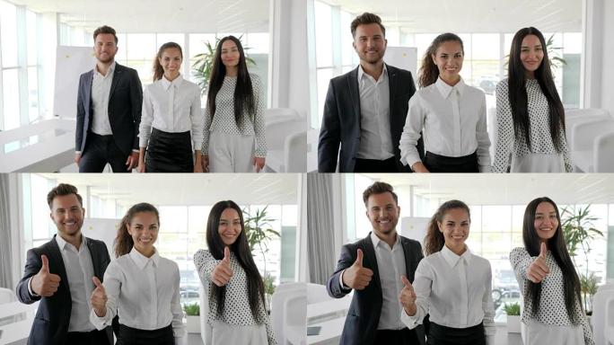 办公室人员在会议室竖起大拇指，三名经理表现出积极的姿态特写，跨国业务