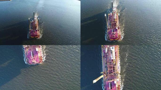 拖船和驳船费城特拉华河的鸟瞰图。
