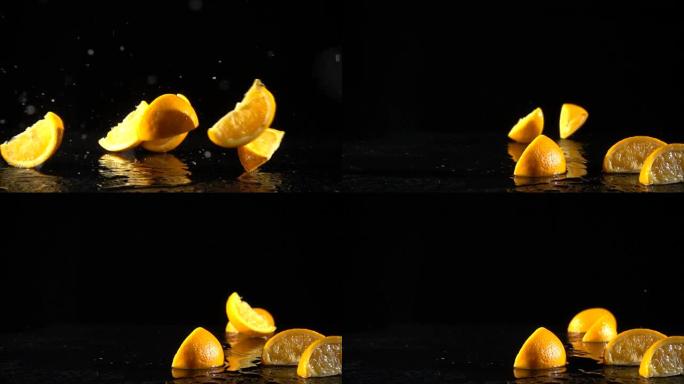 黑色背景上掉落的橙色水果片，慢动作