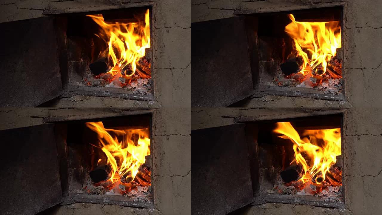 旧炉子的明亮火焰。包括木柴噪音的爆裂声
