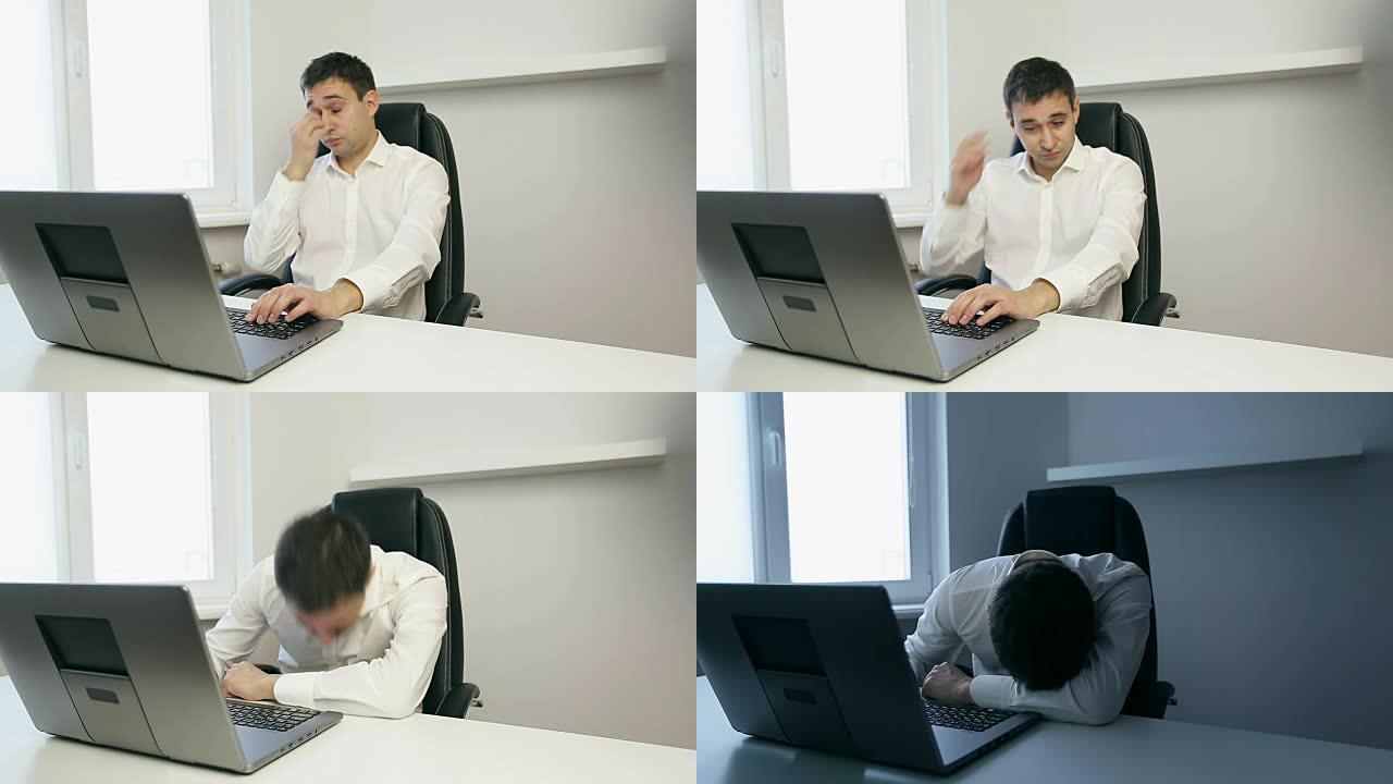 疲惫的商人在笔记本电脑上打字。