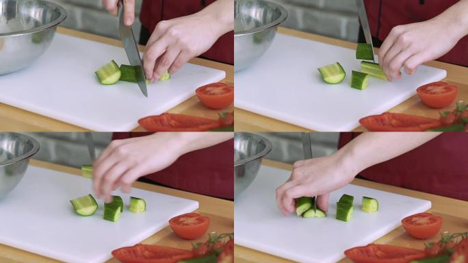 双手切成黄瓜，西红柿，放入碗中。慢慢地