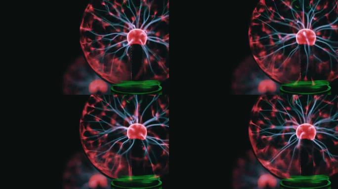 黑色背景上带有移动能量射线的等离子球的特写视图