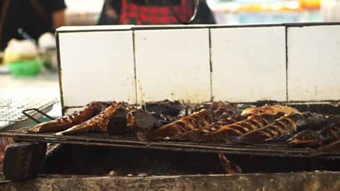 在东南亚本地湿市场烧烤淡水鱼
