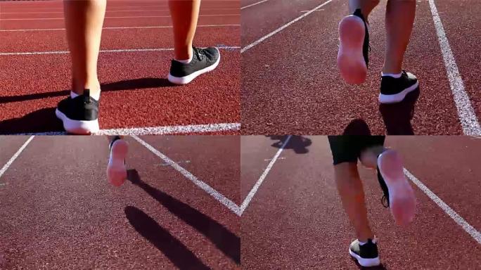 跟踪跑道运动员女子跑步的腿的摄像机
