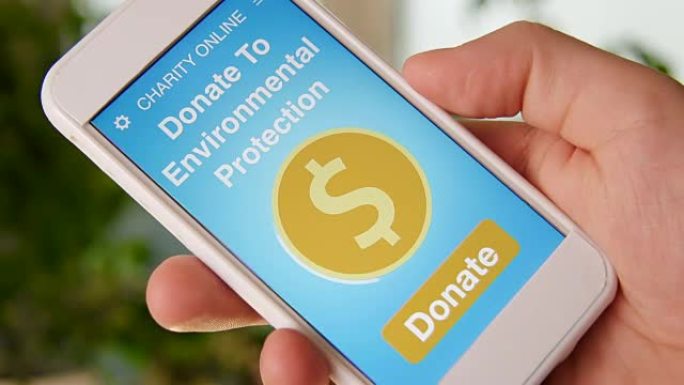 男子在智能手机上使用慈善应用程序进行在线捐赠环境保护