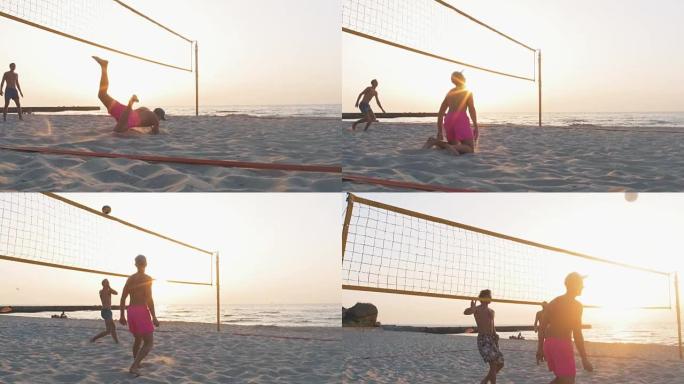 一群人在日出或日落时打沙滩排球