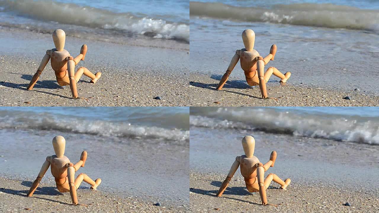海滩上的木制假人。