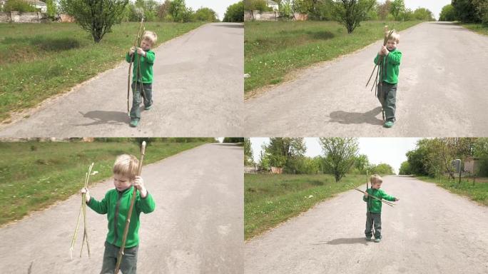 快乐的小男孩玩罗德走户外路