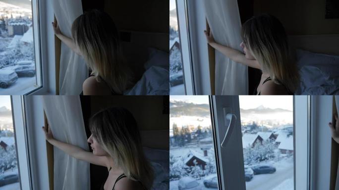 女孩在冬天看着窗外冰雪覆盖的山城