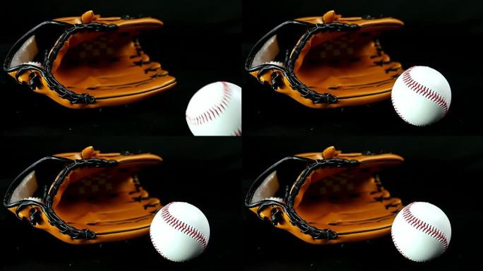 黑色背景上的棒球手套和球，慢动作