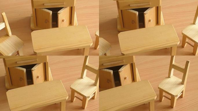 木制娃娃家具: 桌子、椅子和自助餐。儿童微型木制玩具家具。