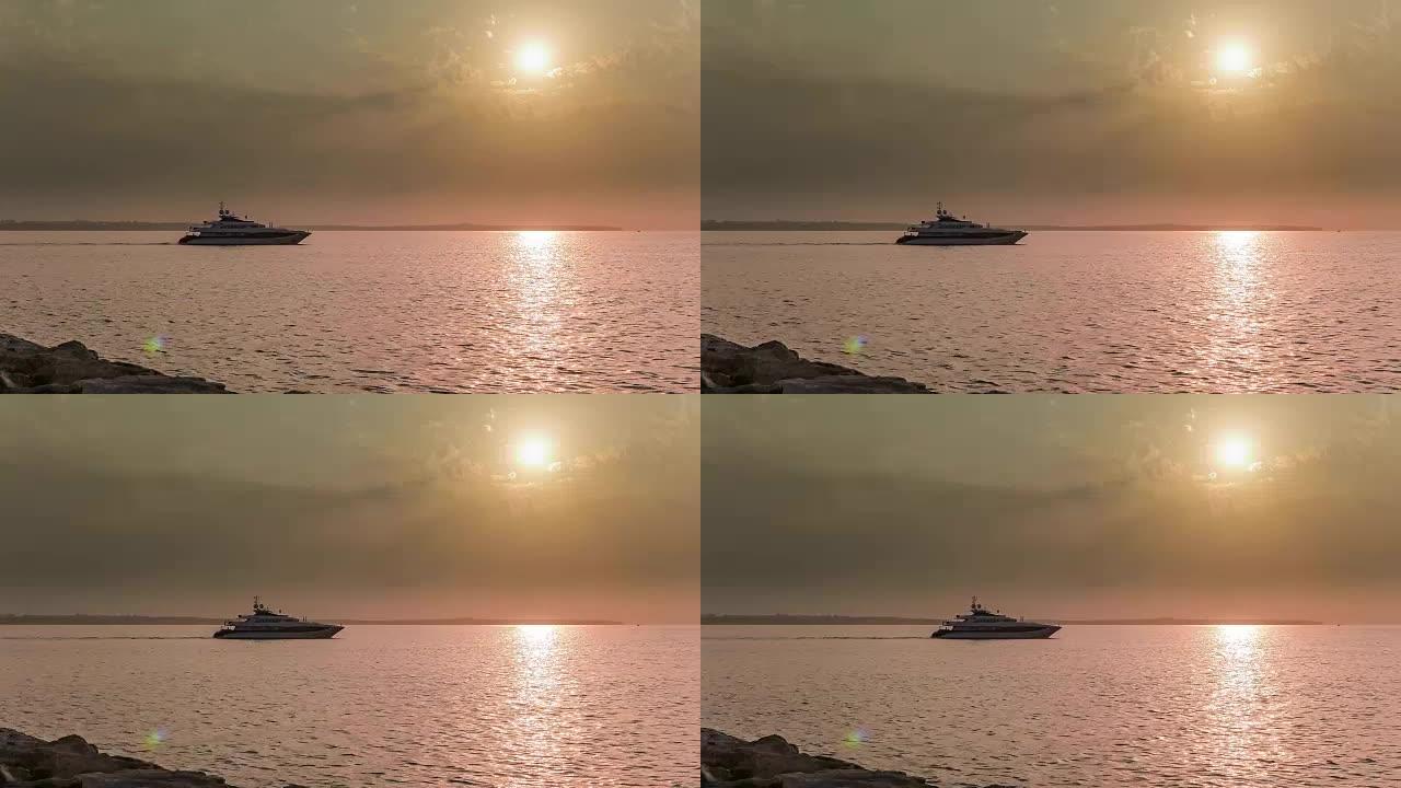 超级游艇驶入日落