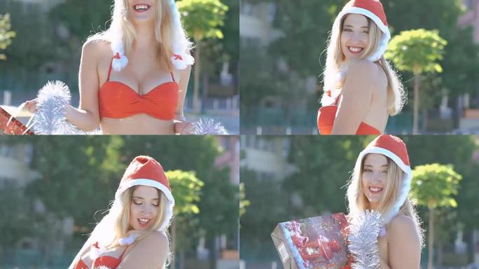 圣诞装饰中的快乐女孩拿着礼物，微笑着去户外拍照