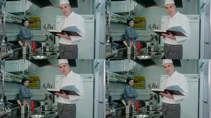 男厨师拿着食谱书，而厨师实习生赞许地点头