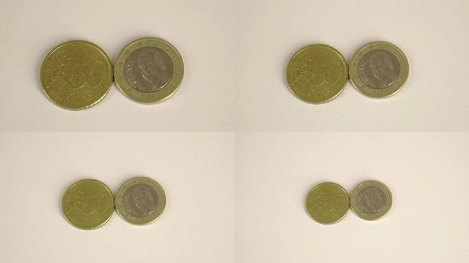 两枚欧元硬币的背面是50西班牙美分和正面细节
