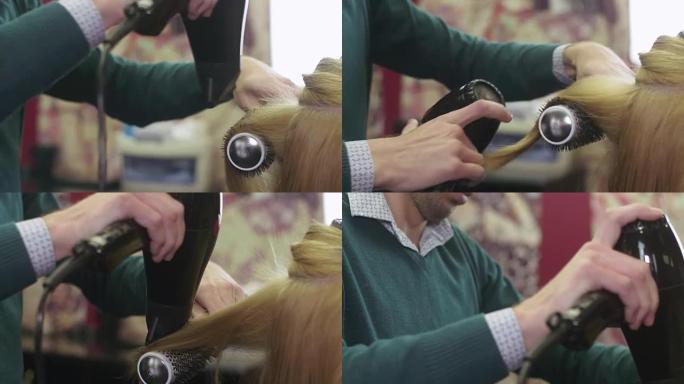理发师在美容院用梳子和吹风机将头发的尖端拉给女孩。制作体积发型