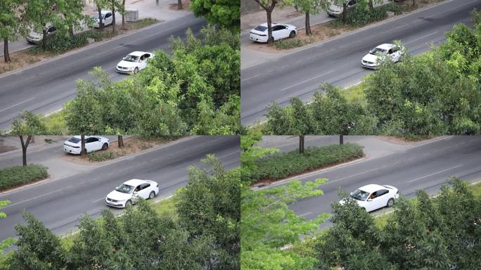 俯视街景跟拍车辆白色大众汽车