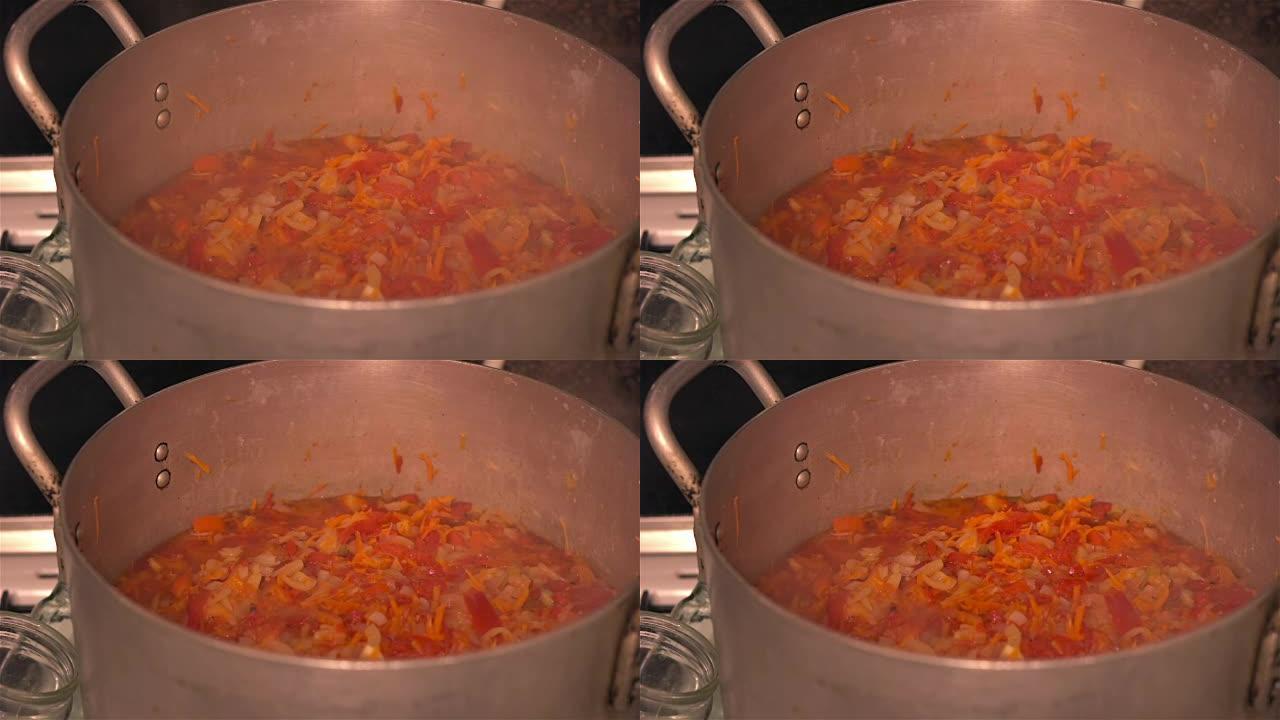 在平底锅中煮蔬菜以进行罐装