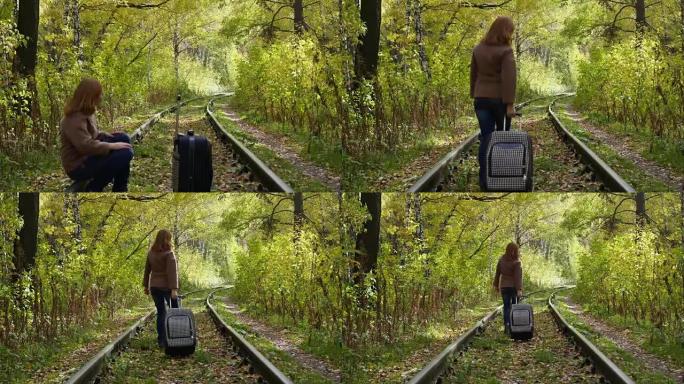 带着手提箱沿着铁路行走的女孩