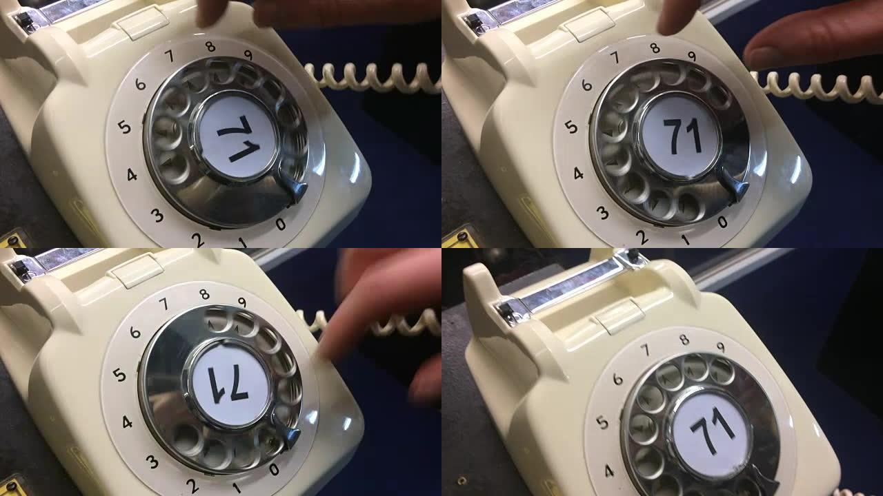 旧电话上的女人手手指拨号号码