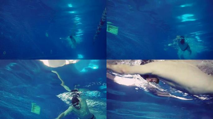 美丽的专业游泳者在游泳池里游泳爬行的水下景色