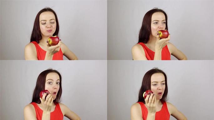 吃红苹果的年轻美女