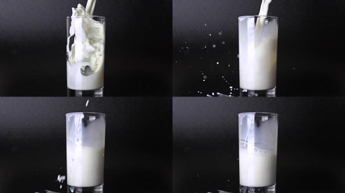 在黑色背景下将牛奶倒入玻璃中。500 fps超慢动作视频