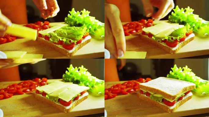 用奶酪片和面包覆盖三明治，特写镜头