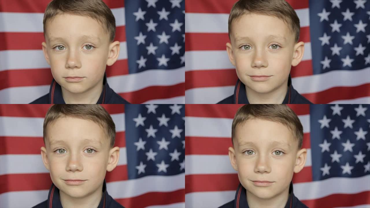 以美国旗帜为背景的男孩肖像。近距离