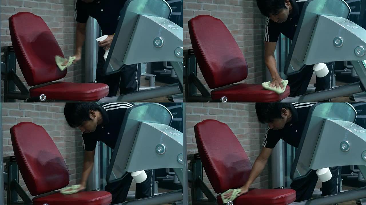 亚洲男子清洁健身器材