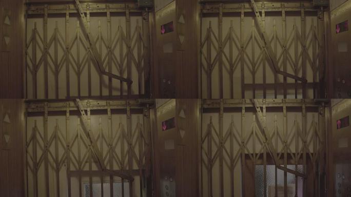 下降多层的旧黄铜电梯 -- 无色原木镜头
