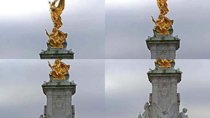 宫殿前有一个带翅膀的人的金色雕像