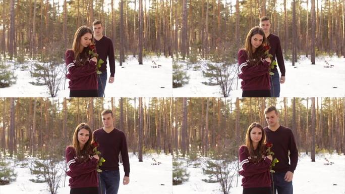 冬季森林中的幸福夫妇。全高清视频