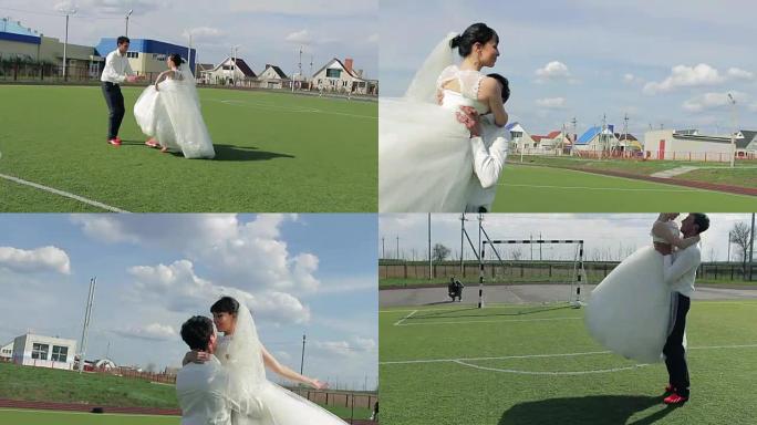 足球场上的新娘和新郎，充满爱的感情