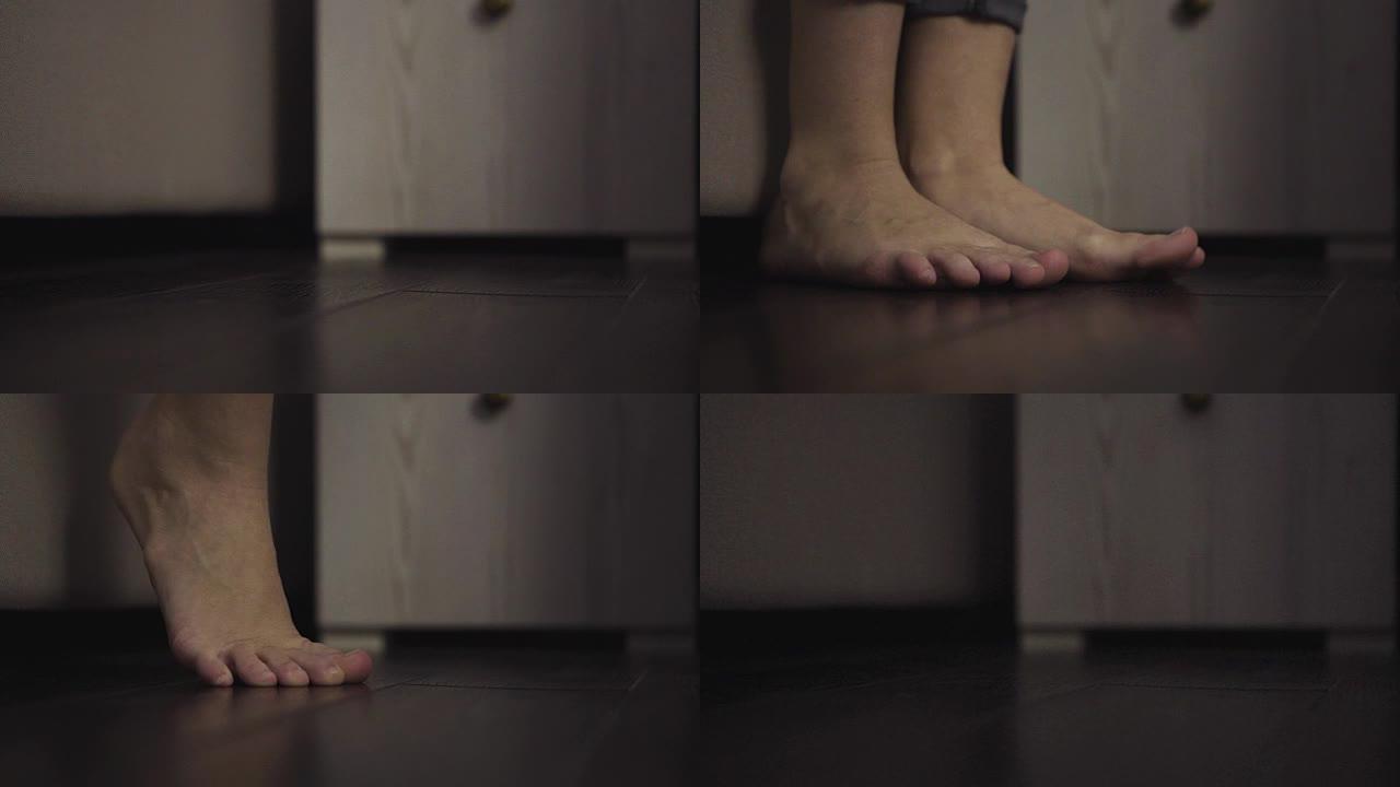 慢动作特写镜头的脚走出困境，撞到地板上。